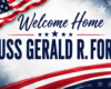 Patriotic banner reading 'Welcome Home' for the USS Gerald R. Ford, with a waving American flag and red‑white‑blue design.